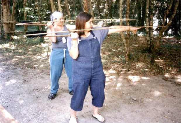 Asia and Utika having a go with spearthrowers, Prehistoparc at Tursac 