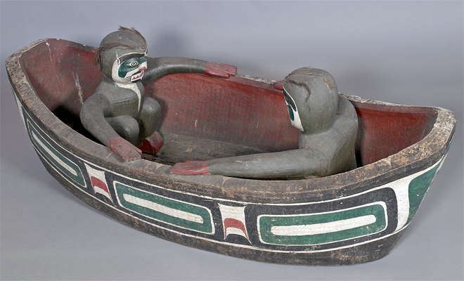 Boat shape with human figures